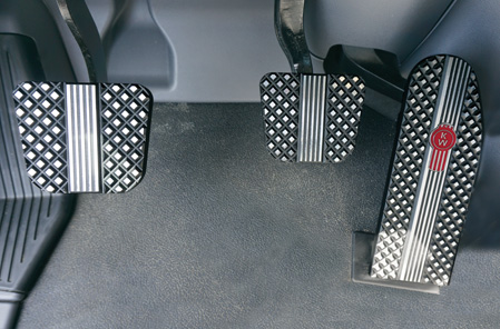 Kenworth Black Diamond Crown-Cut Billet Billet Logo Pedals Available at Kenworth Dealers