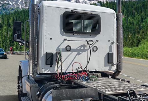 Stealth Black Window Guard and Peterbilt Truck