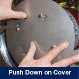 2. Push Down on Cover